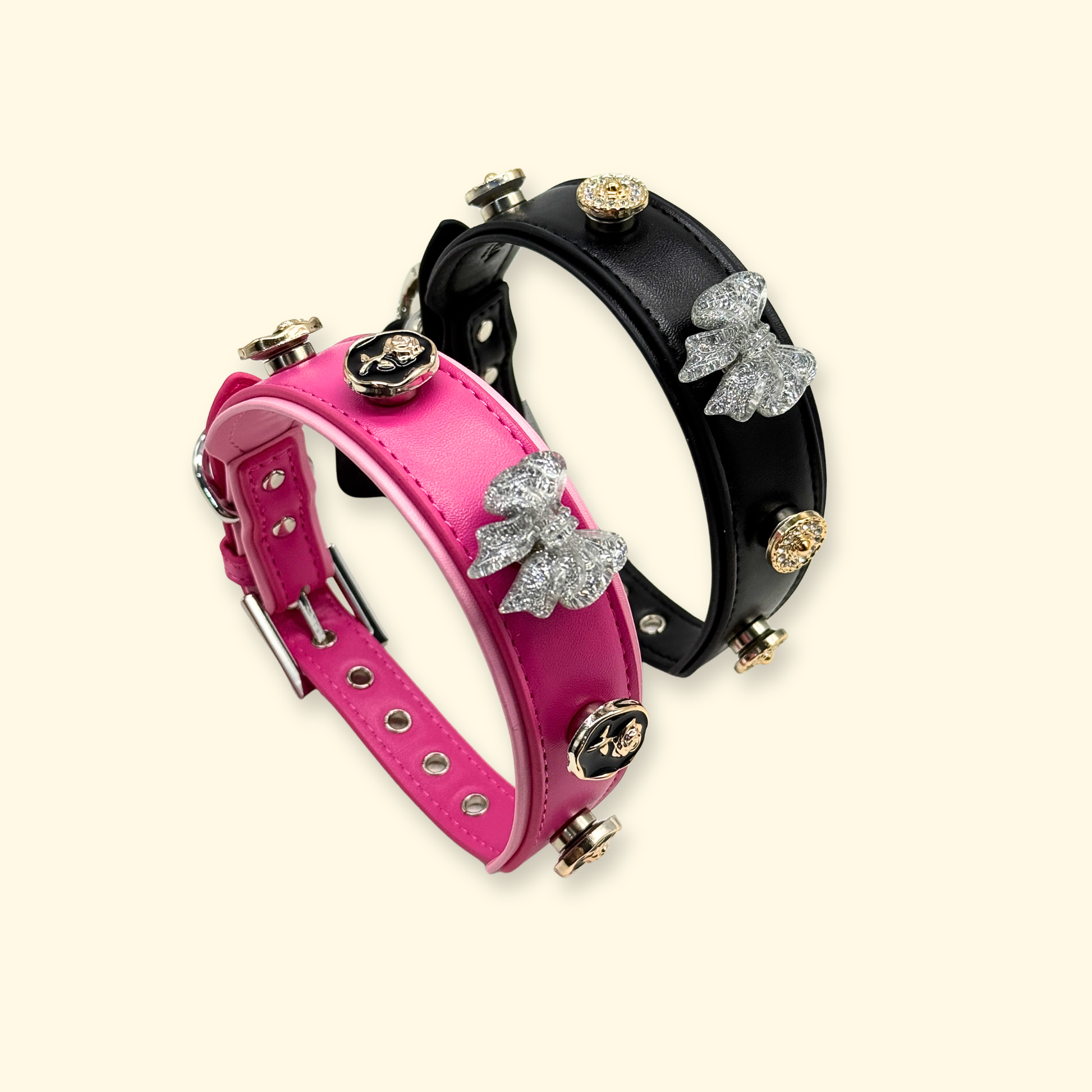 Black and pink Petiria interchangeable dog collars styled with vintage bow, rose, and rhinestone snap-on collar charms.