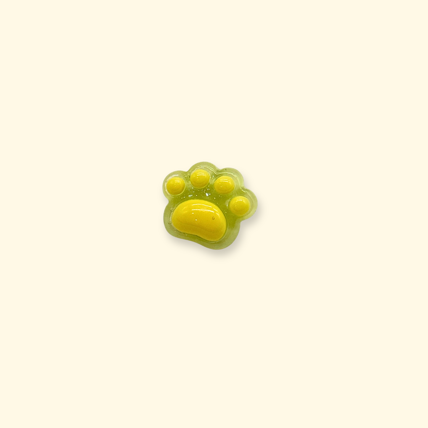 Yellow paw print snap-on charm for dog collars, lightweight interchangeable pet accessory for daily wear